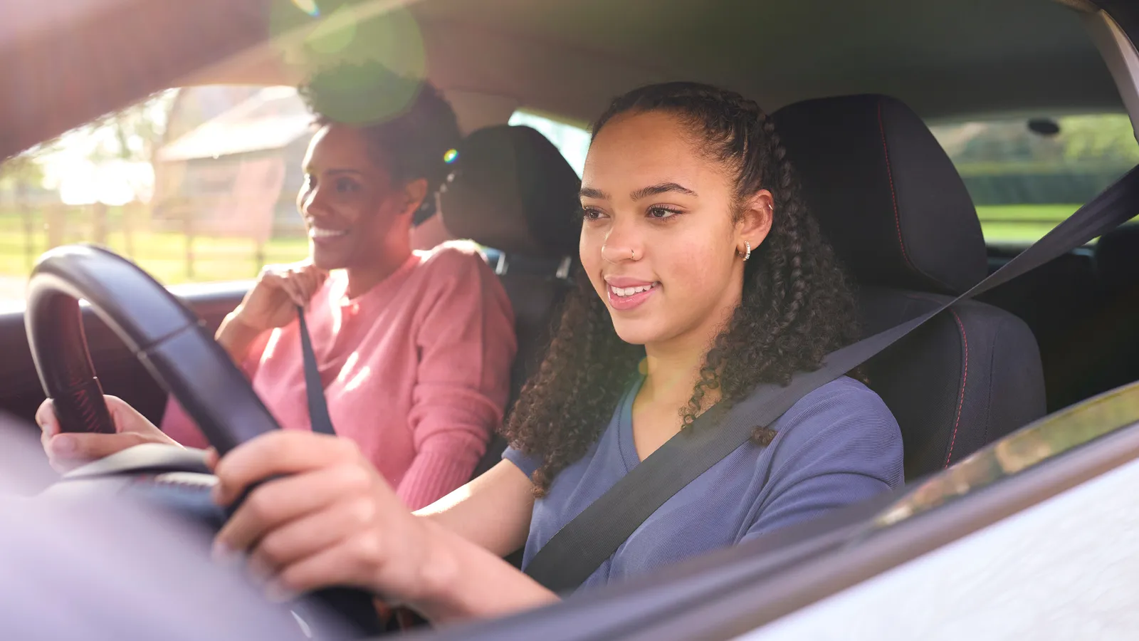 Mother and teen in a car together